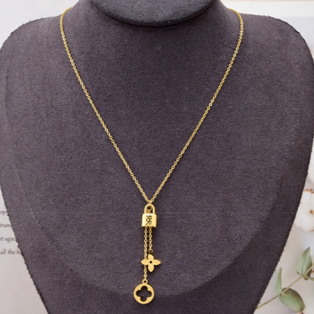 Clovers & lock gold necklace